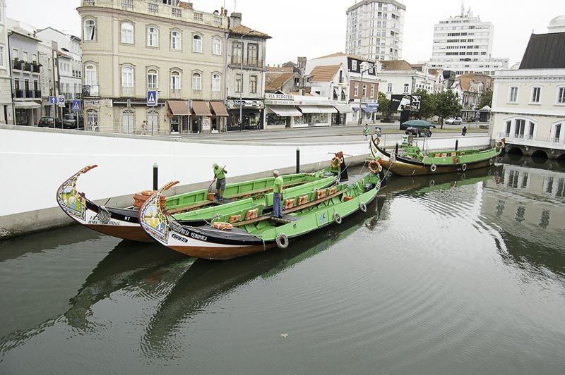 green boats at Aveiro as a stopover for a drive from lisbon to porto