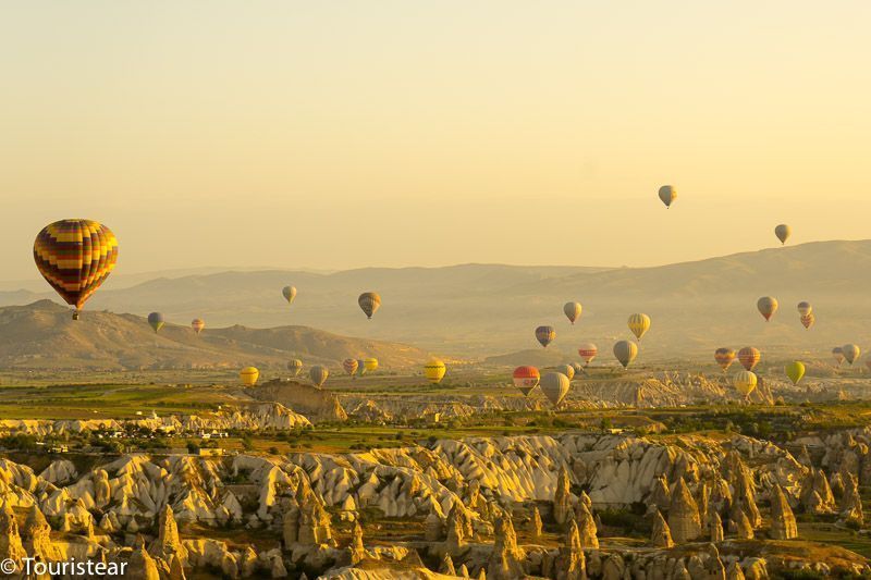 turkey, cappadocia, hot air balloons at sunrise