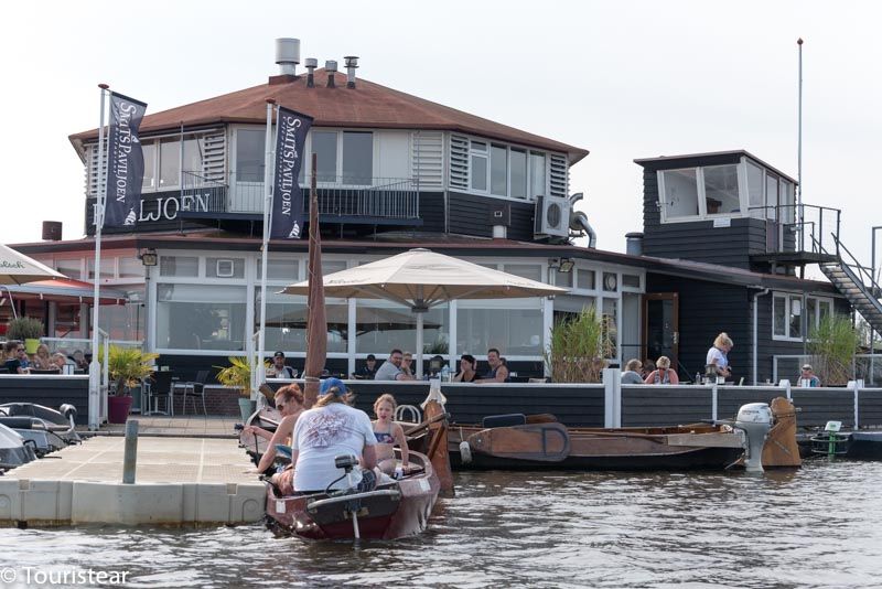 Park your boat on an island and have a drink, Giethoorn The Netherlands