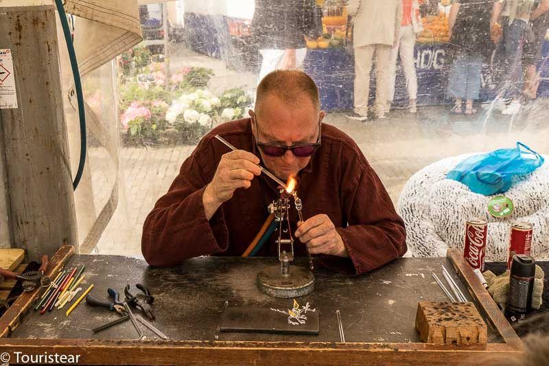 gouda cheese market, artisan in gouda, low countries