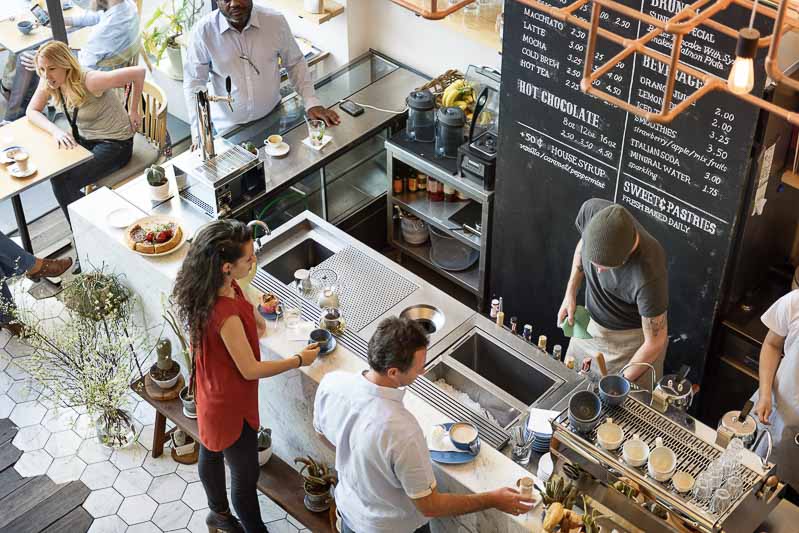 a coffee shop packed with customers