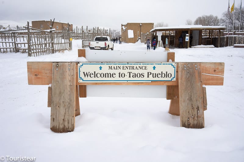 The main entrance to Taos town with snow