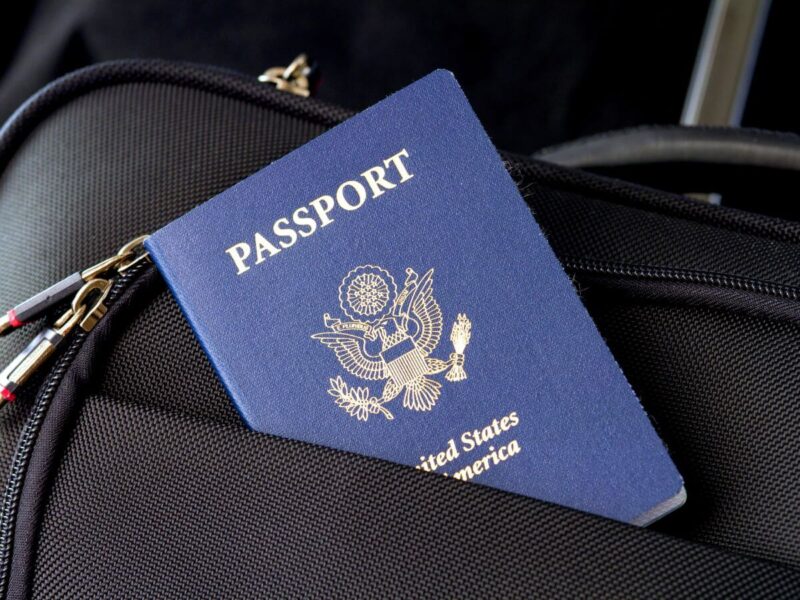 American passport inside a black bag as a requirement when renting a car in the usa 